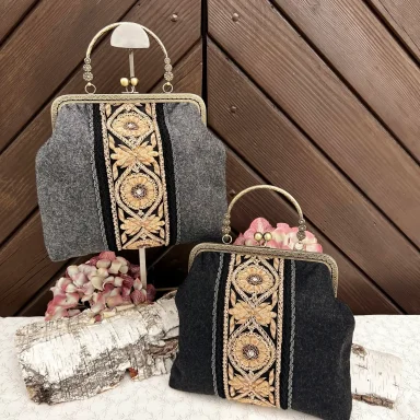 Elegante Trachtentaschen in grau und schwarz mit Goldstickerei